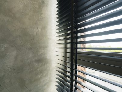 window blind shutter with light shadow and concrete wall